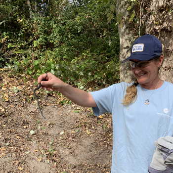 Among many things we unearthed during the grounds clean-up, Michele Smith was the only one brave enough to pick up this garden snake.